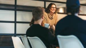 People having a casual, friendly meeting