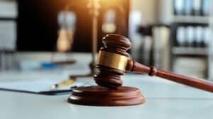 Wooden gavel on a desk in court