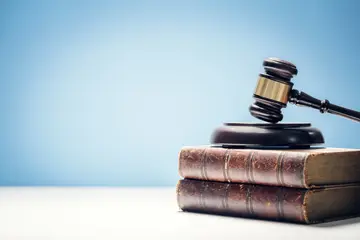 Gavel on a stack of books