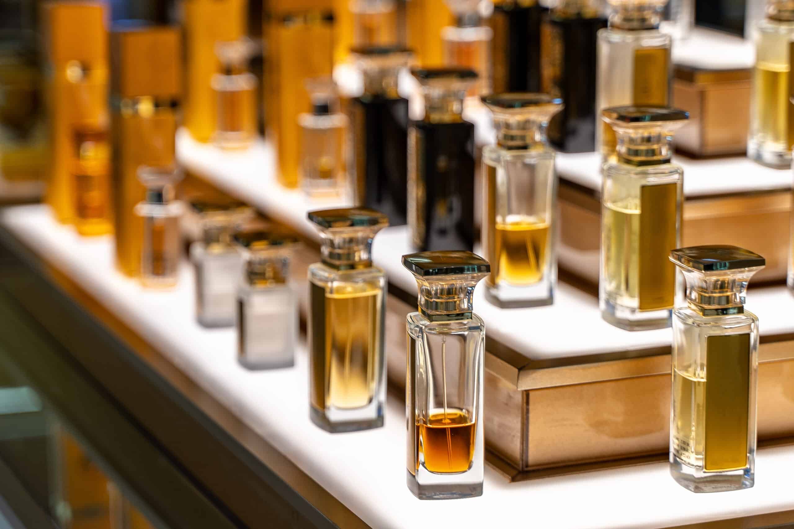 Elegant perfume bottles displayed on boutique shelves